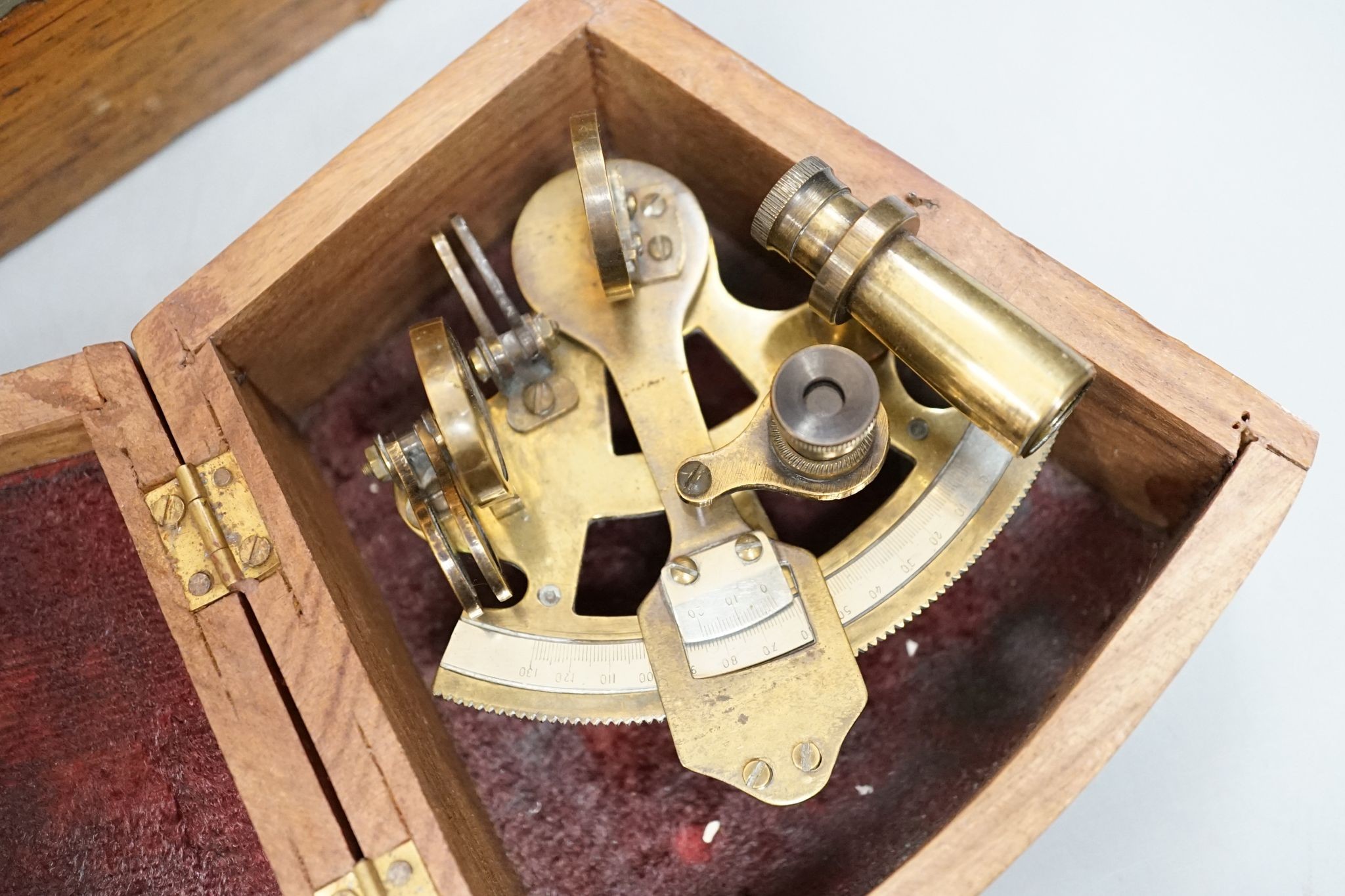 A writing slope, box and miniature Stanley sextant